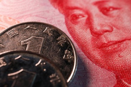 EMERGING MARKETS-Asian currencies broadly flat, China’s yuan falls