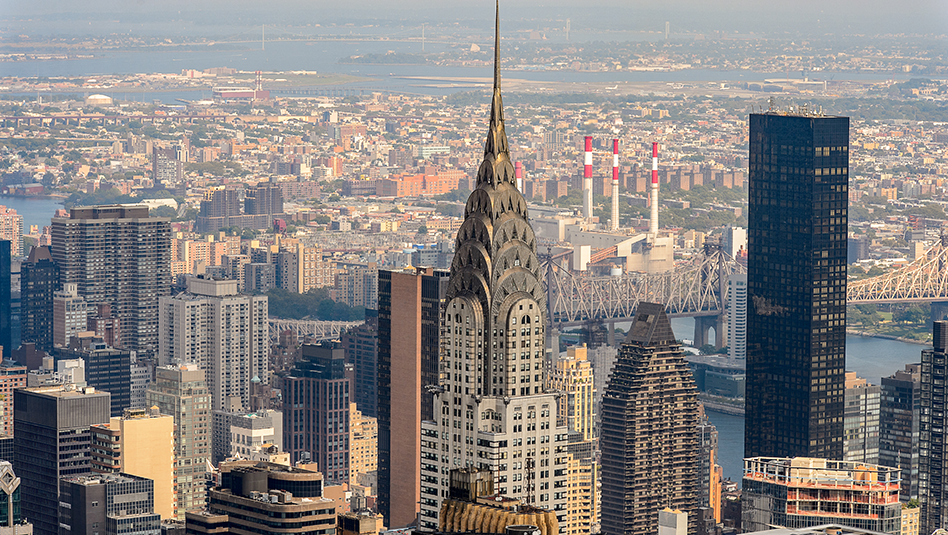 New York City skyline with the Chrysler building in the middle.