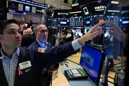 Dow closes at record high, Nvidia falls after forecast