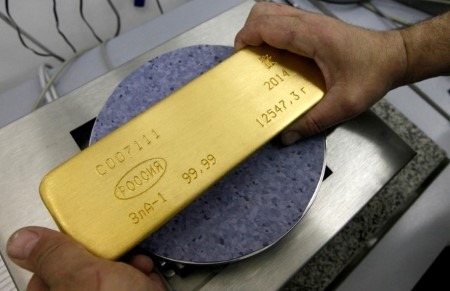 Gold hits record highs on US election uncertainty, more policy easing