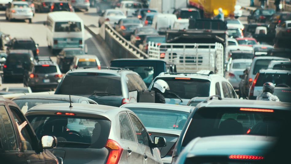 A traffic jam with cars and trucks