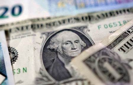 Dollar gains, yen slips as Japanese yields tumble
