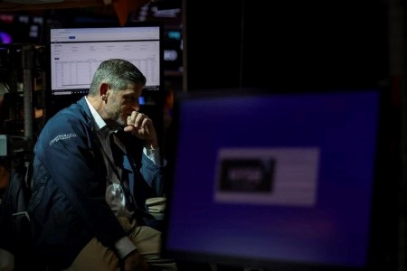 Indexes end down after chip designers ease late; Nvidia jumps after the bell