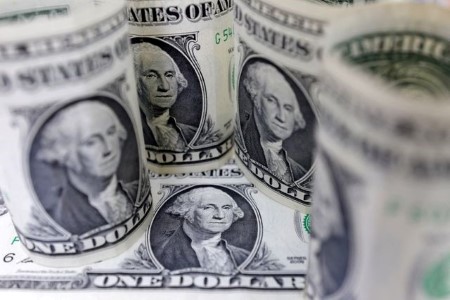 US dollar drops as investors prepare for court battle on tariffs