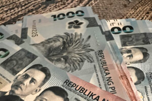 Peso declines versus dollar