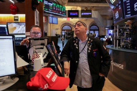 Nasdaq notches record high close; traders focus on rate cuts