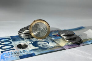Peso sinks as BSP chief says weak growth may lead to another rate cut