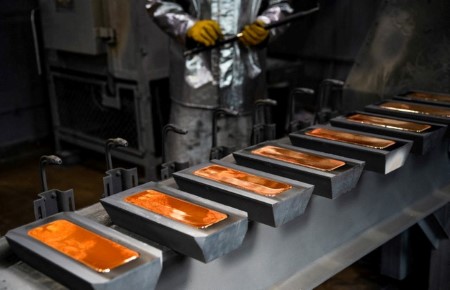 Gold rises as a divided Fed cuts rates; silver hits record high