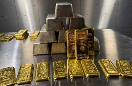 Gold hits record high on safe-haven demand; silver climbs to new peak